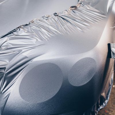 car-wrapping-specialist-putting-vinyl-foil-film-car-selective-focus (2)